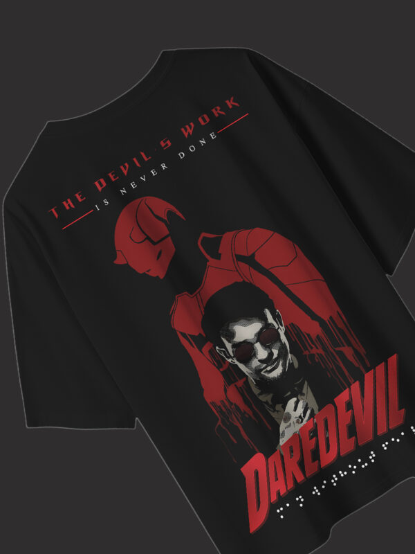 Model wearing black Daredevil oversized T-shirt with The Man Without Fear print – Wear Heroic streetwear